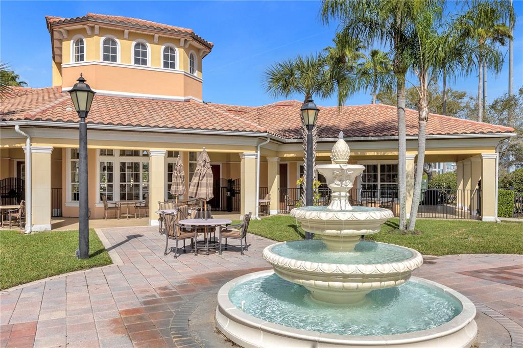 8774 Worldquest Boulevard Orlando, FL 32821 - Photo 34 of 35 a view of a house with a patio