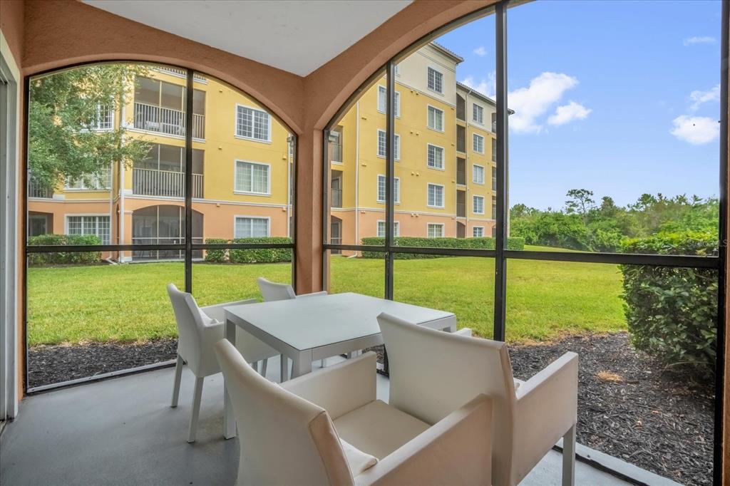 8774 Worldquest Boulevard Orlando, FL 32821 - Photo 4 of 35 a view of swimming pool from a patio