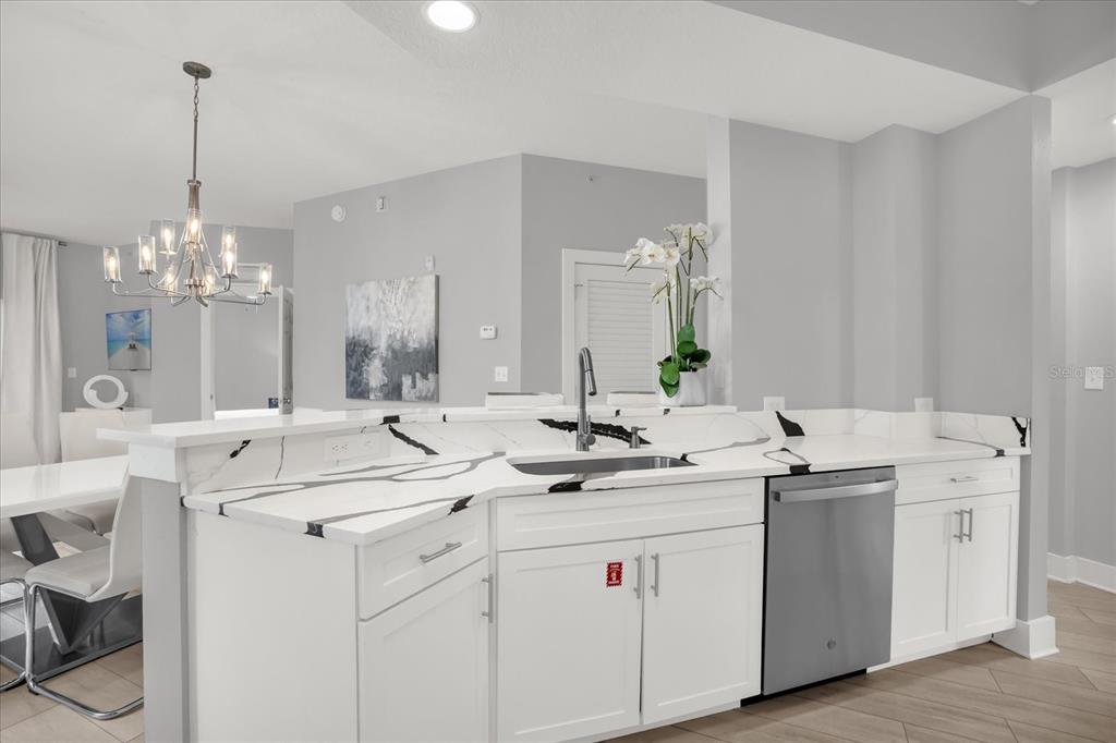 8774 Worldquest Boulevard Orlando, FL 32821 - Photo 6 of 35 a bathroom with a sink double vanity and a mirror