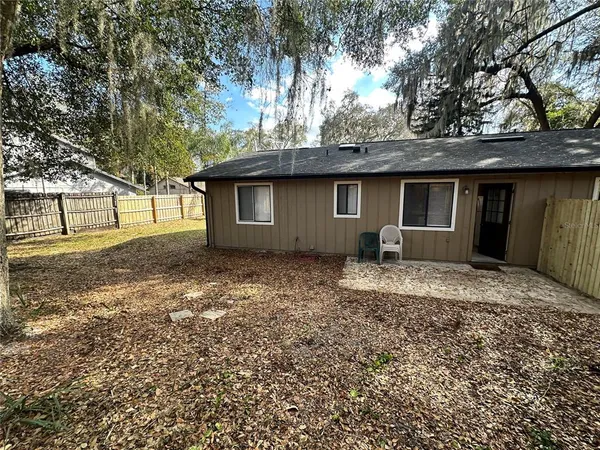a house view with a outdoor space