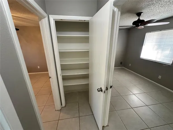 a view of an empty walk in closet