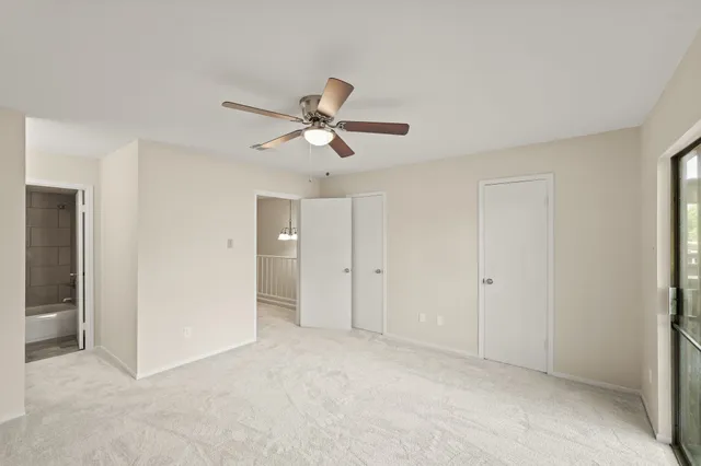 a view of a big room with carpet
