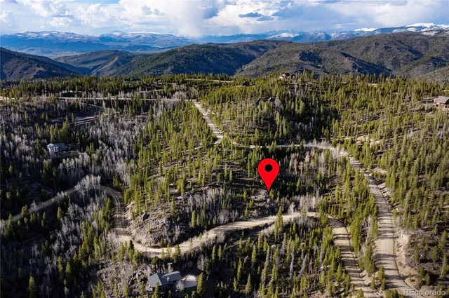 a view of water heater with wooden floor
