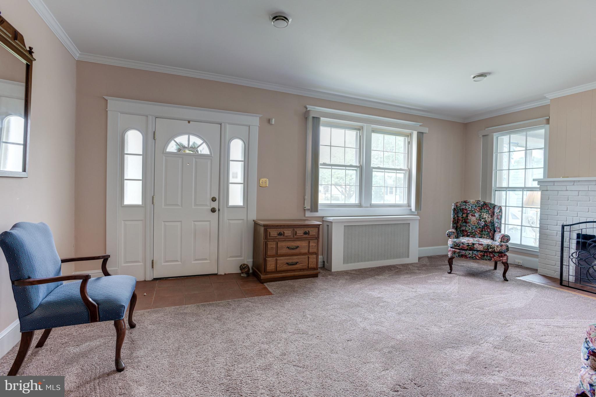 4307 Fordham Road Baltimore, MD 21229 - Photo 4 of 44 Living Room | Fireplace | Crown Molding