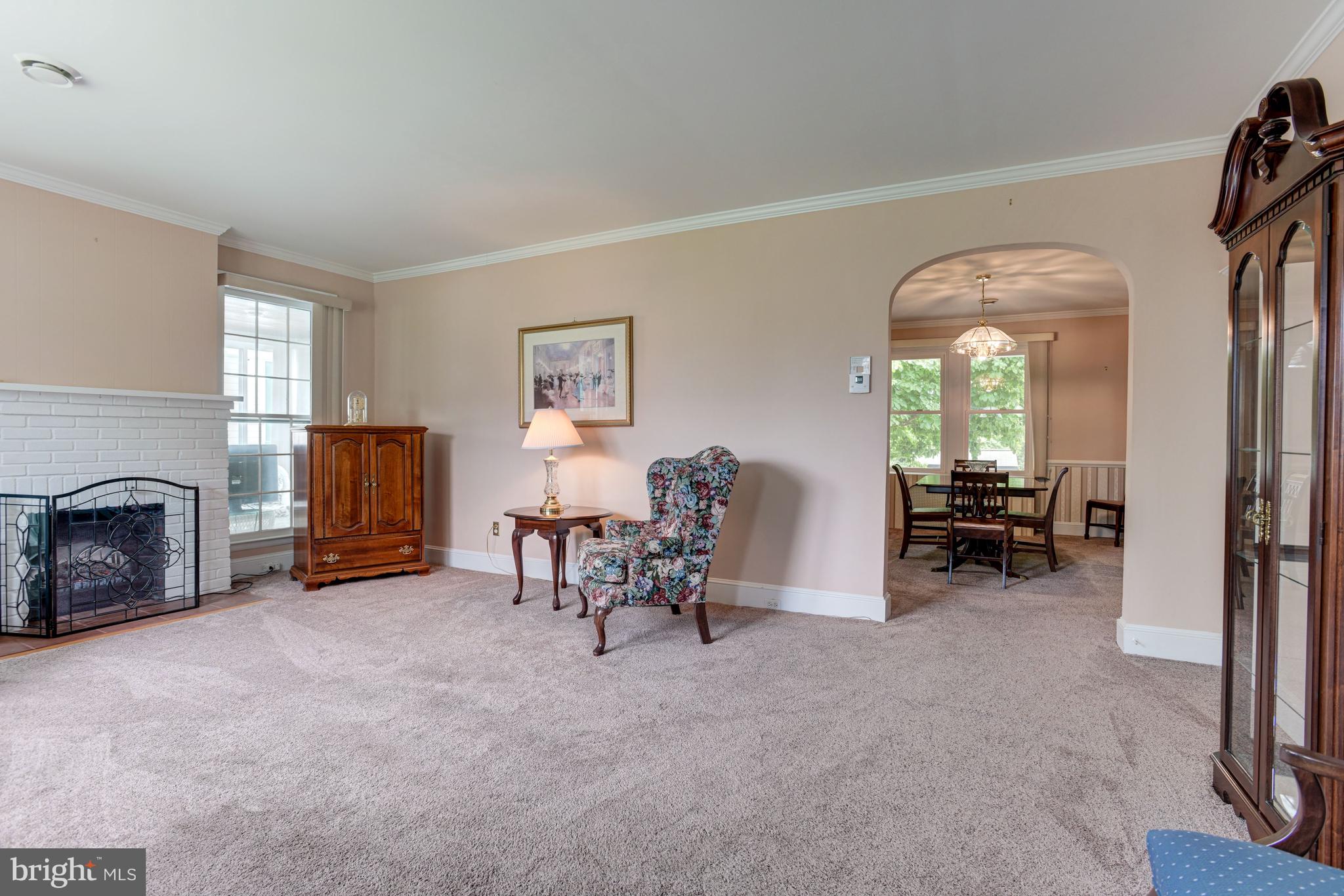 4307 Fordham Road Baltimore, MD 21229 - Photo 5 of 44 Living Room | Fireplace | Crown Molding