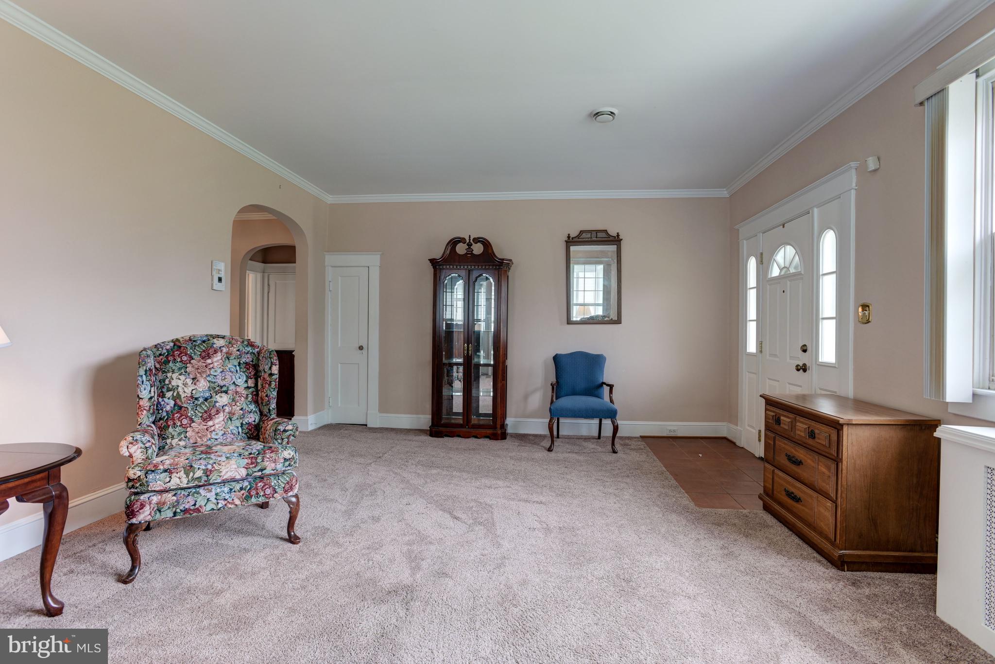 4307 Fordham Road Baltimore, MD 21229 - Photo 6 of 44 Living Room | Fireplace | Crown Molding