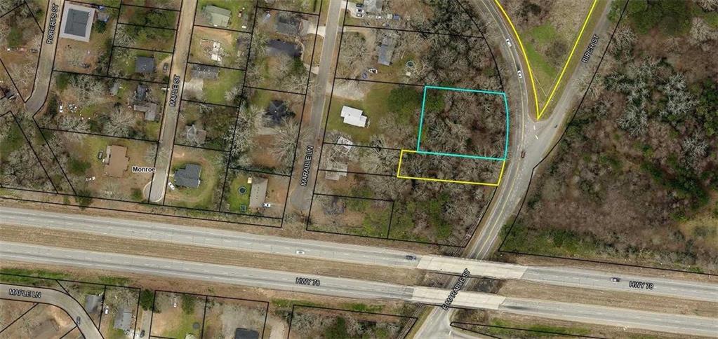 515 Birch Street Monroe, GA 30656 - Photo 6 of 6 a bathroom with a sink and shower