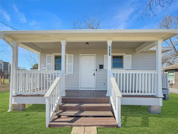 a view of porch with a yard