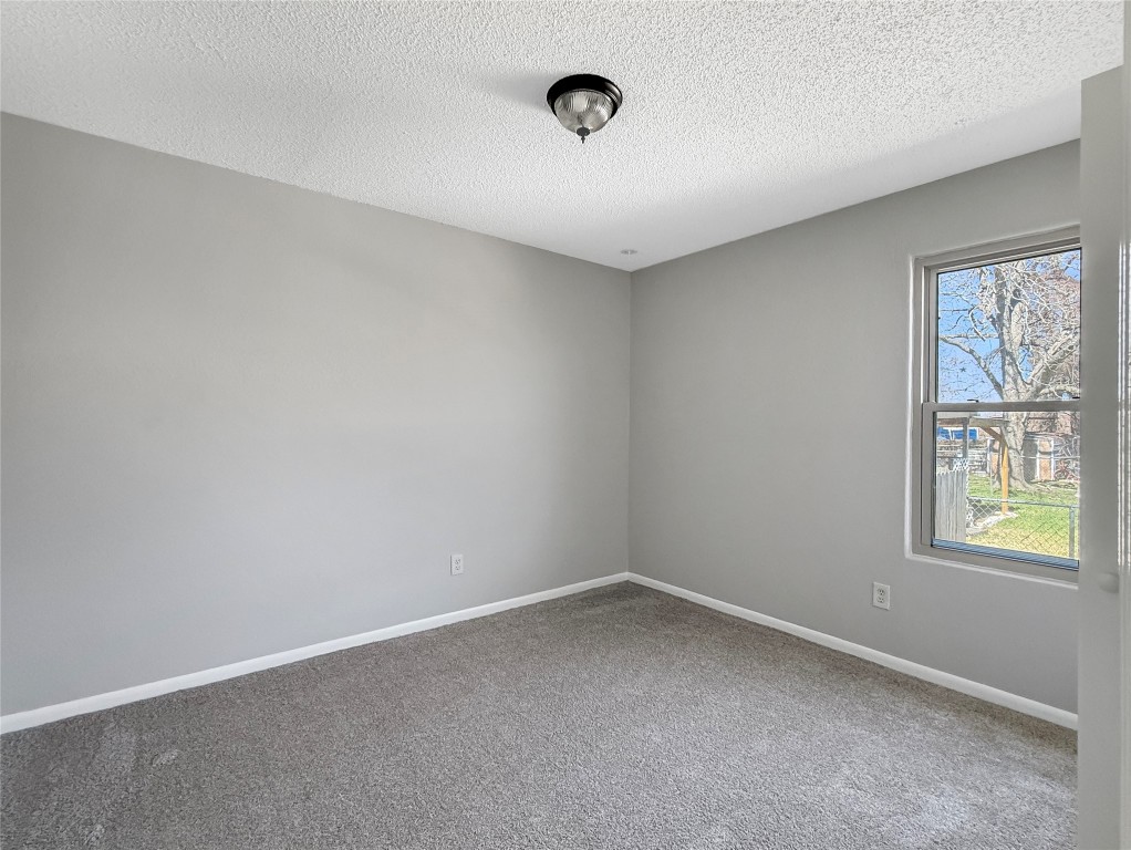 114 8th Street Rosenberg, TX 77471 - Photo 14 of 19 an empty room with windows