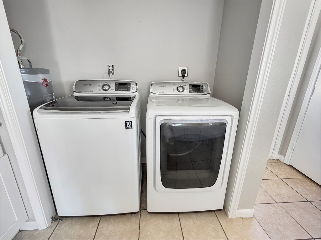 114 8th Street Rosenberg, TX 77471 - Photo 15 of 19 a utility room with dryer and washer