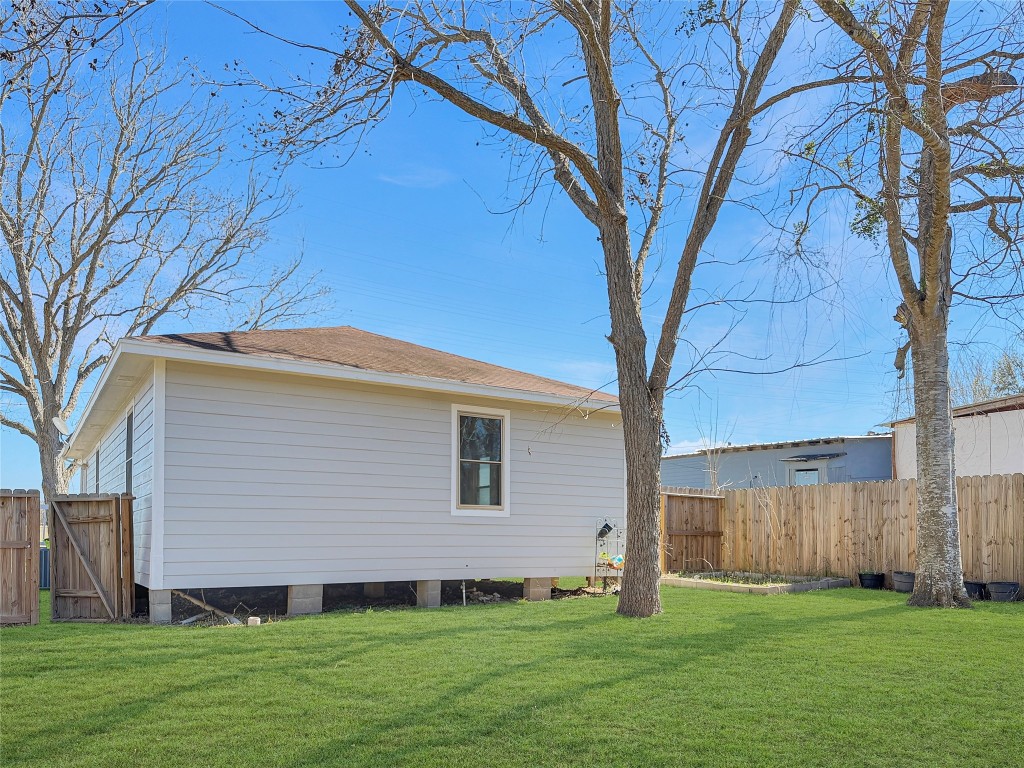 114 8th Street Rosenberg, TX 77471 - Photo 19 of 19 a backyard of a house with lots of green space