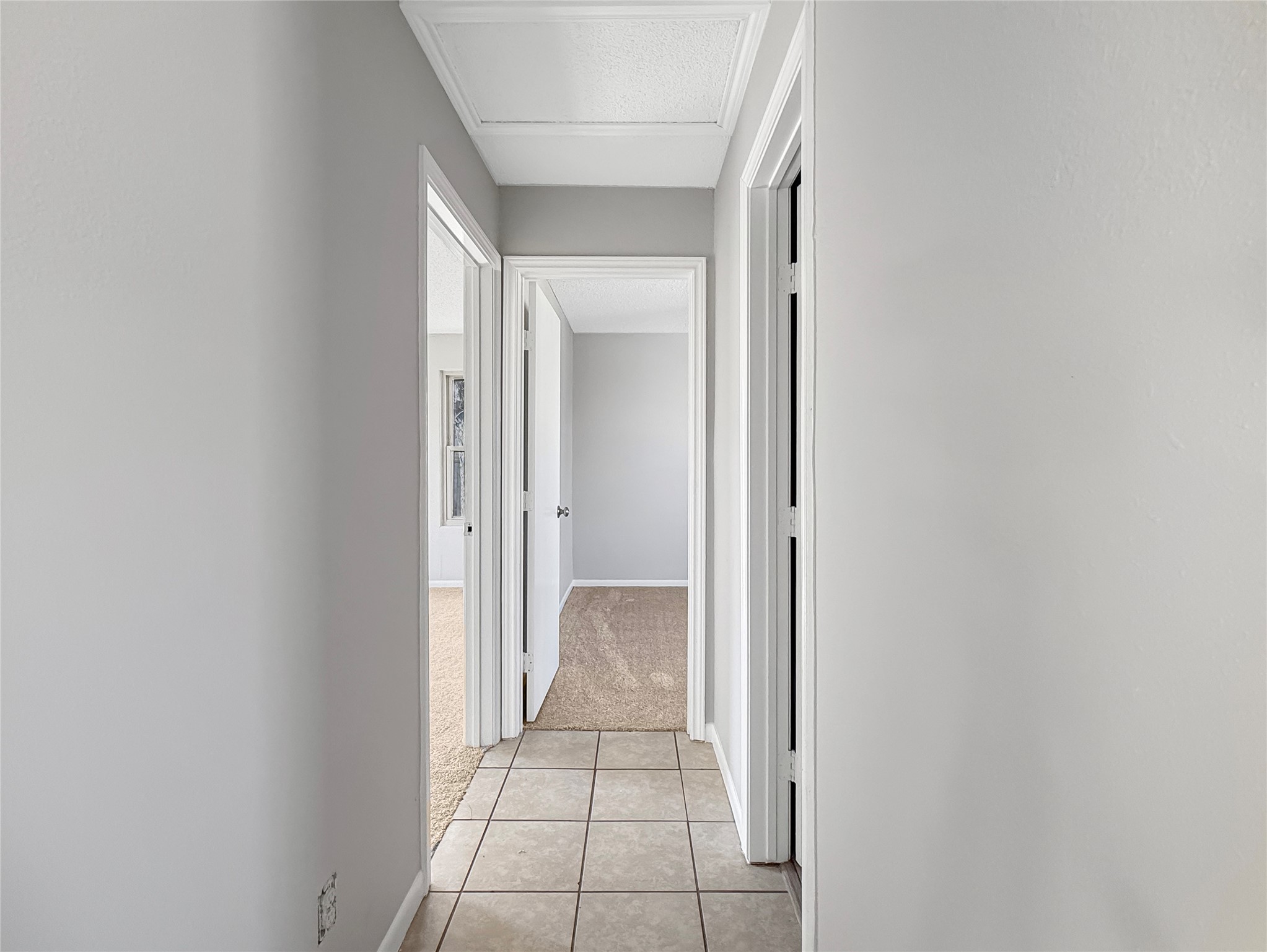 114 8th Street Rosenberg, TX 77471 - Photo 8 of 19 a view of a bathroom from a corridor