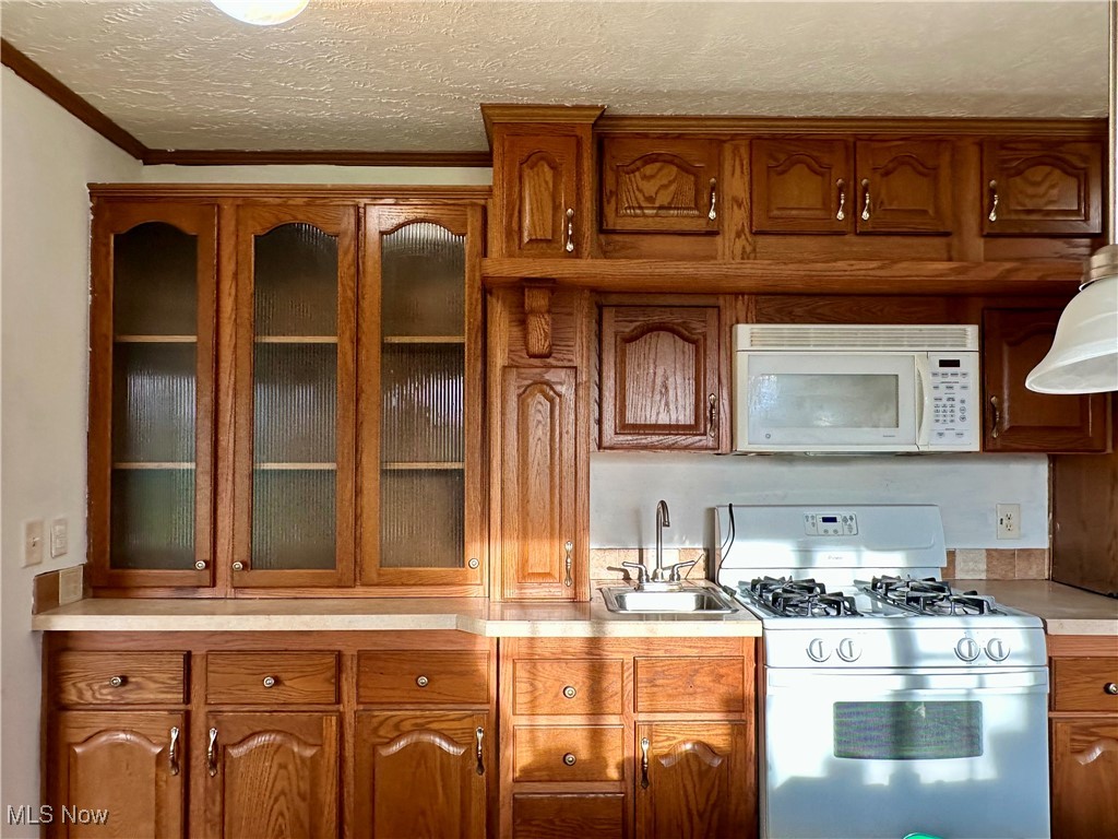 164 Anderson Road Fleming, OH 45729 - Photo 13 of 31 Built-in cabinets on both sides of stove