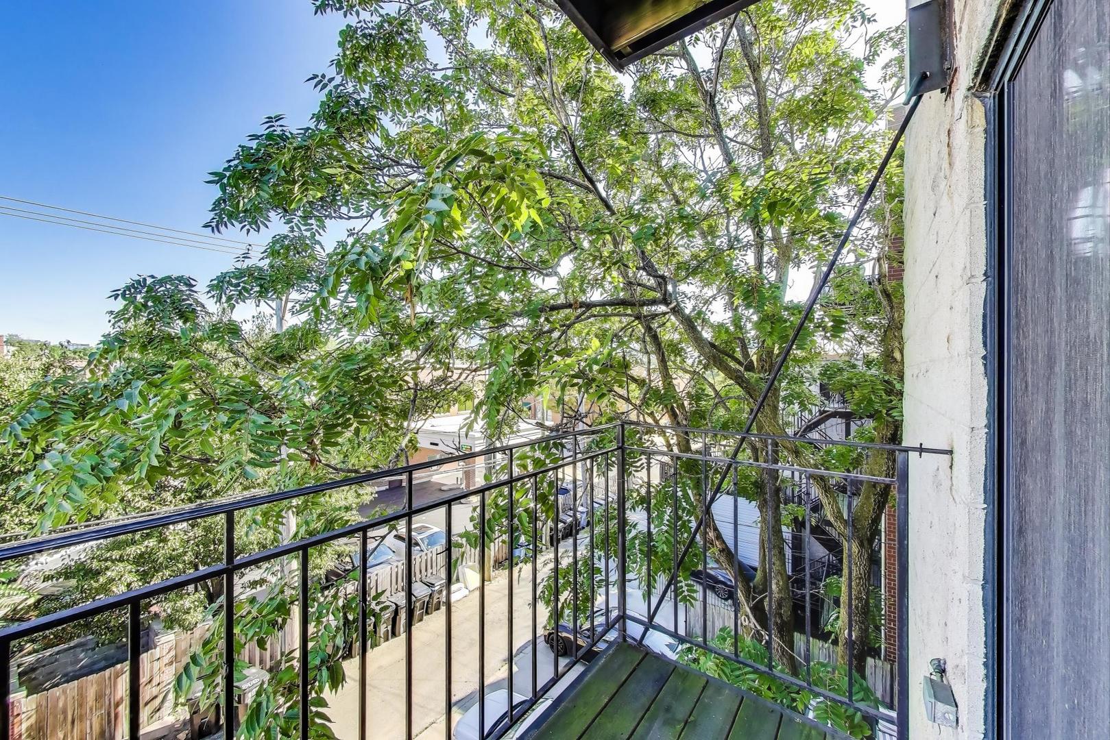 1308 West Fillmore Street, Unit 3 Chicago, IL 60607 - Photo 16 of 23 a view of a balcony with an outdoor space