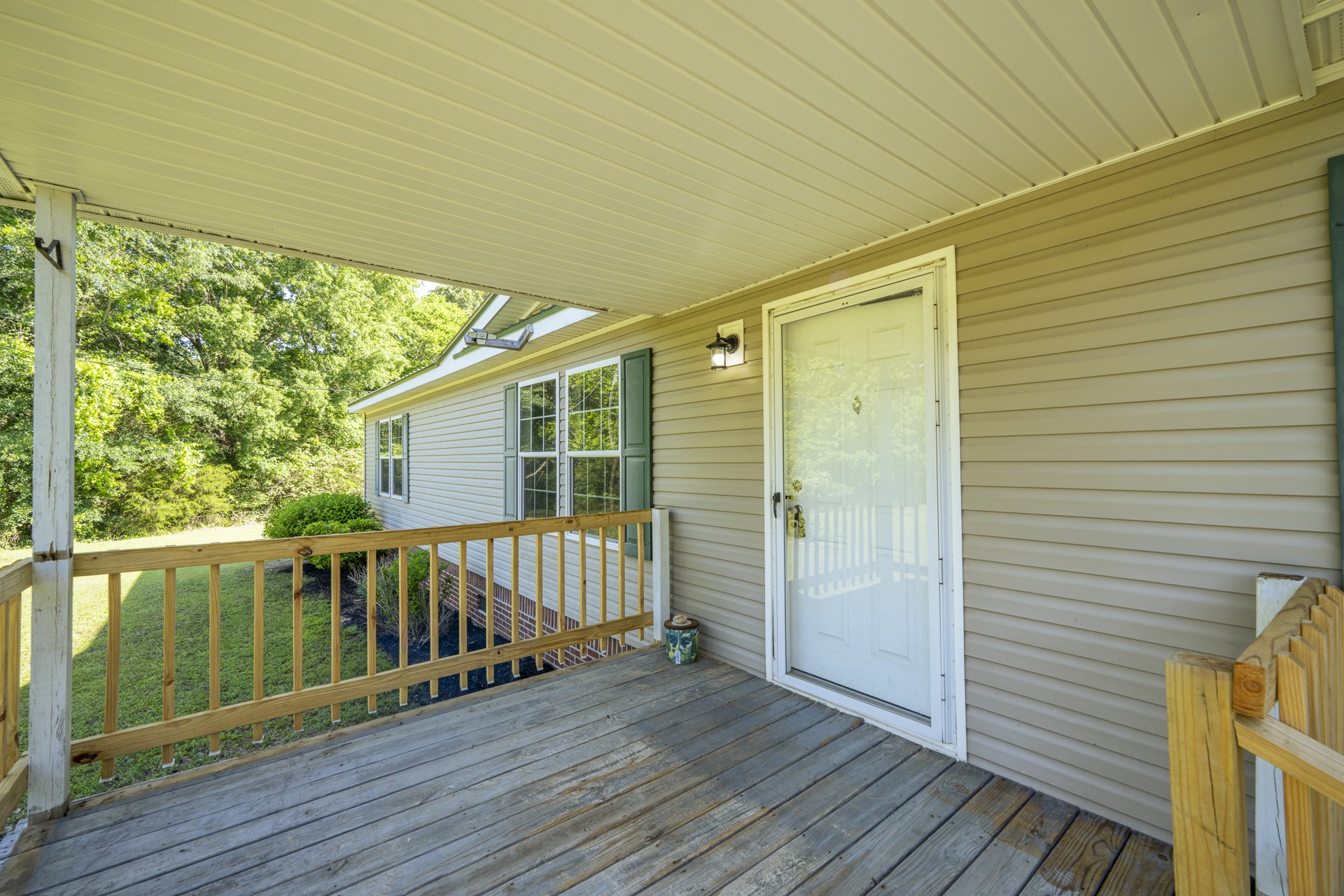 1125 Clifft Road Bolivar, TN 38008 - Photo 47 of 78 a view of a wooden deck