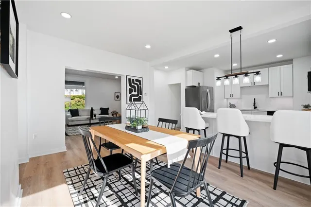 a view of a dining room with furniture
