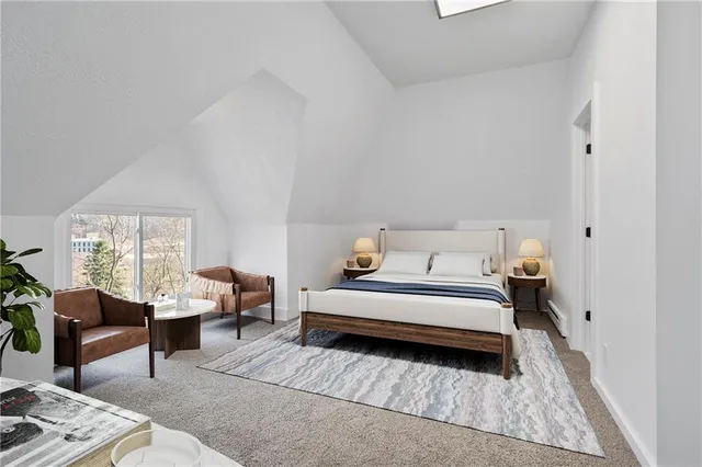 a bed room with a bed and wooden floor