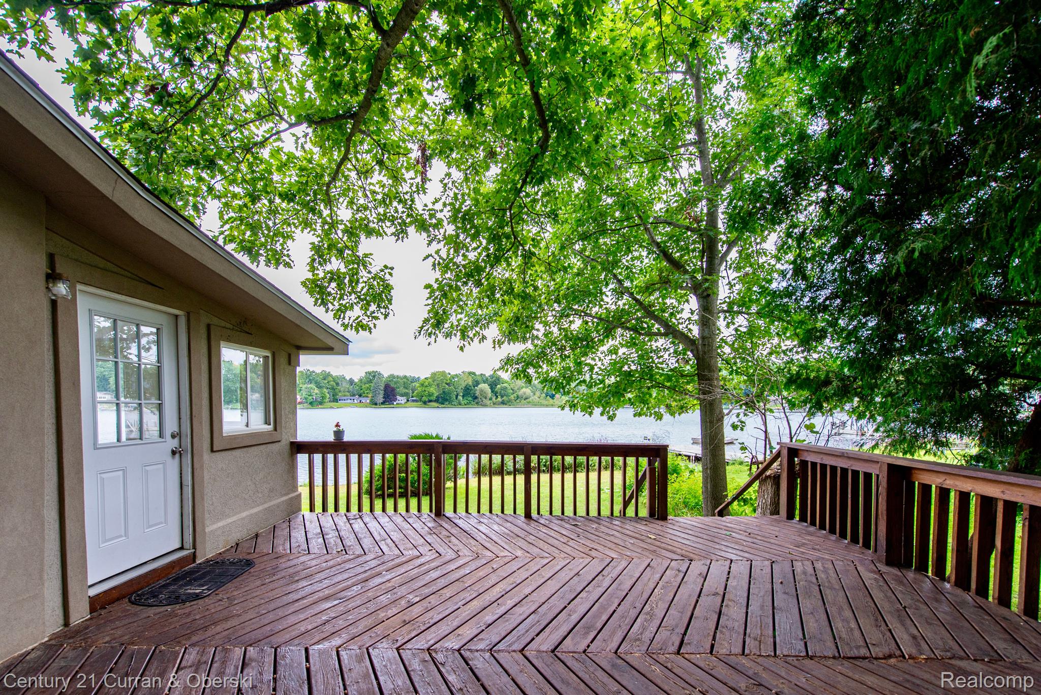9688 Boucher Road Otter Lake, MI 48464 - Photo 20 of 24 Deck with lake views