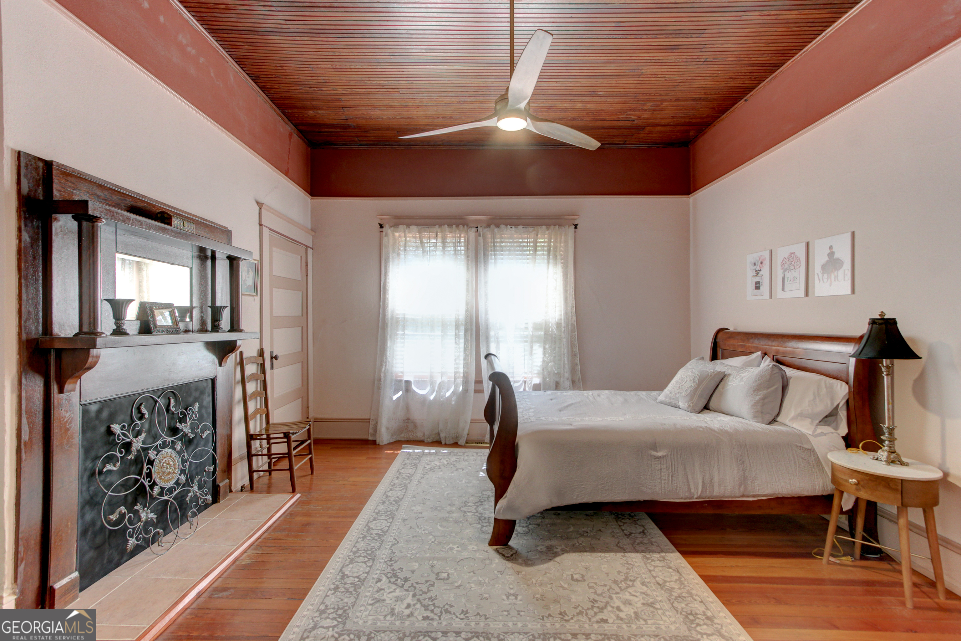 127 Wilkins Road Fayetteville, GA 30214 - Photo 21 of 53 a bedroom with furniture and a wooden floor