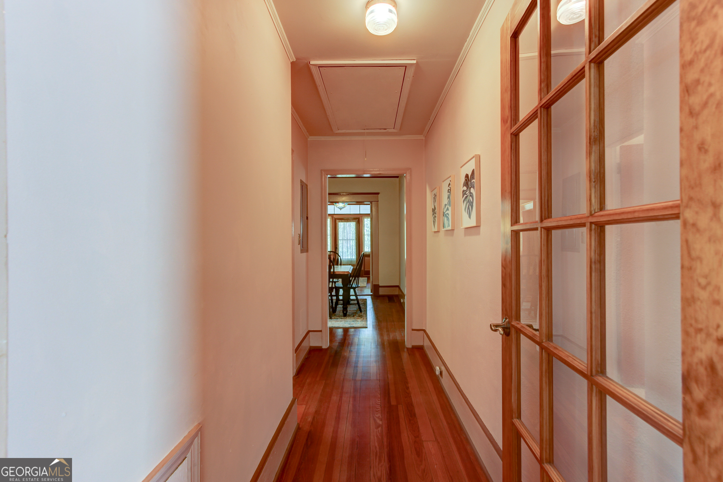 127 Wilkins Road Fayetteville, GA 30214 - Photo 29 of 53 a view of a hallway with wooden floor and staircase