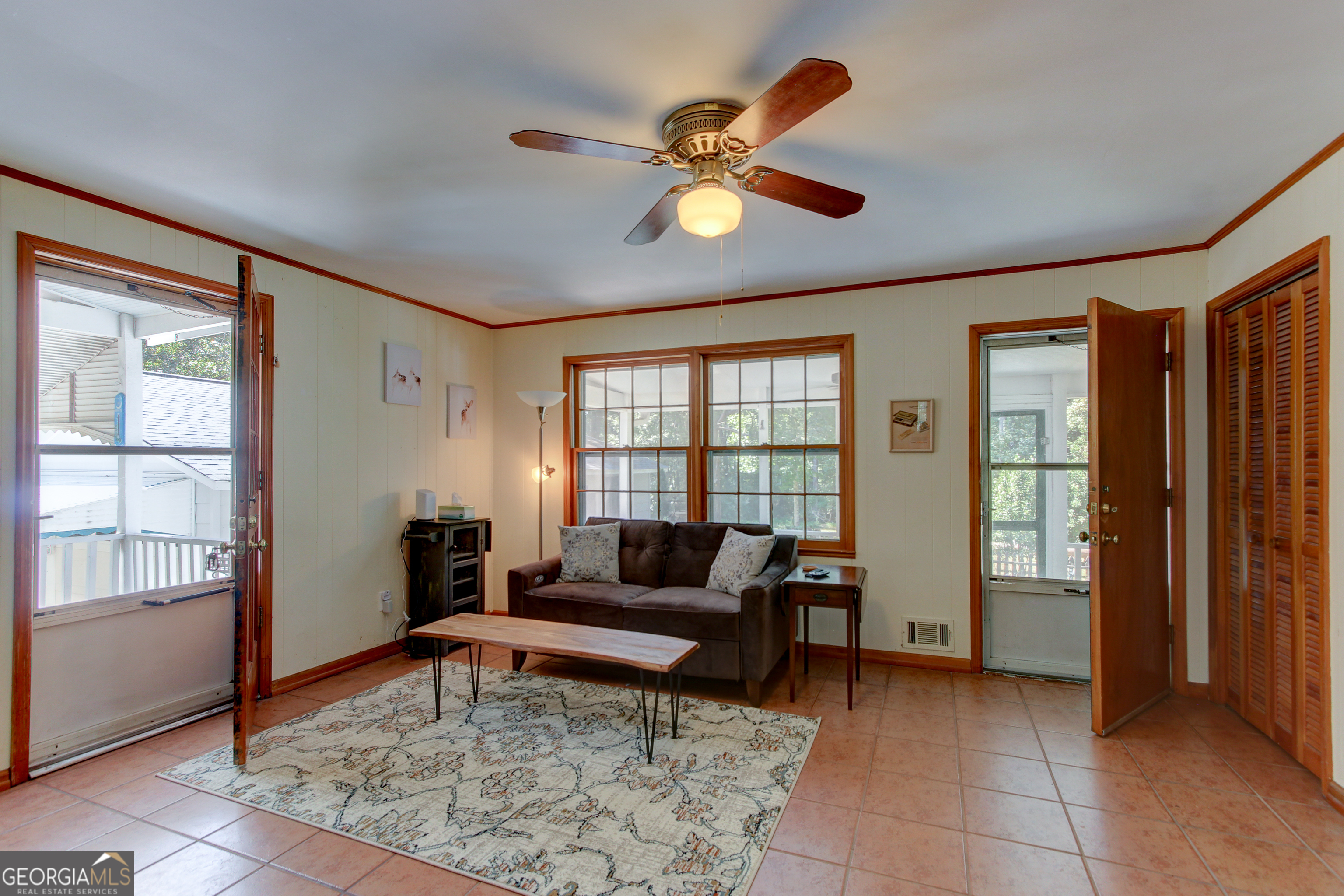 127 Wilkins Road Fayetteville, GA 30214 - Photo 30 of 53 a living room with furniture and a window