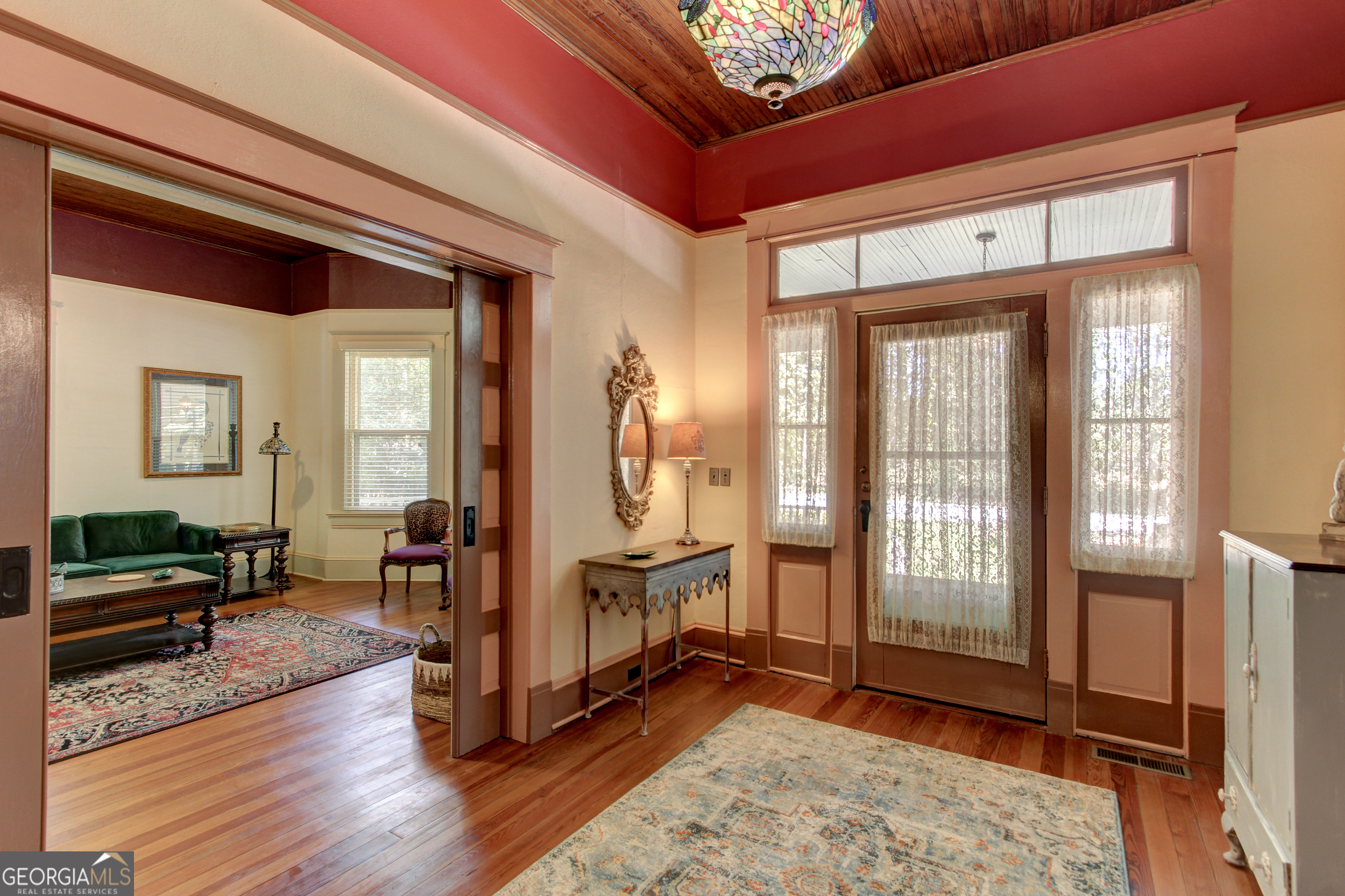 127 Wilkins Road Fayetteville, GA 30214 - Photo 3 of 53 a view of an entryway with wooden floor and door