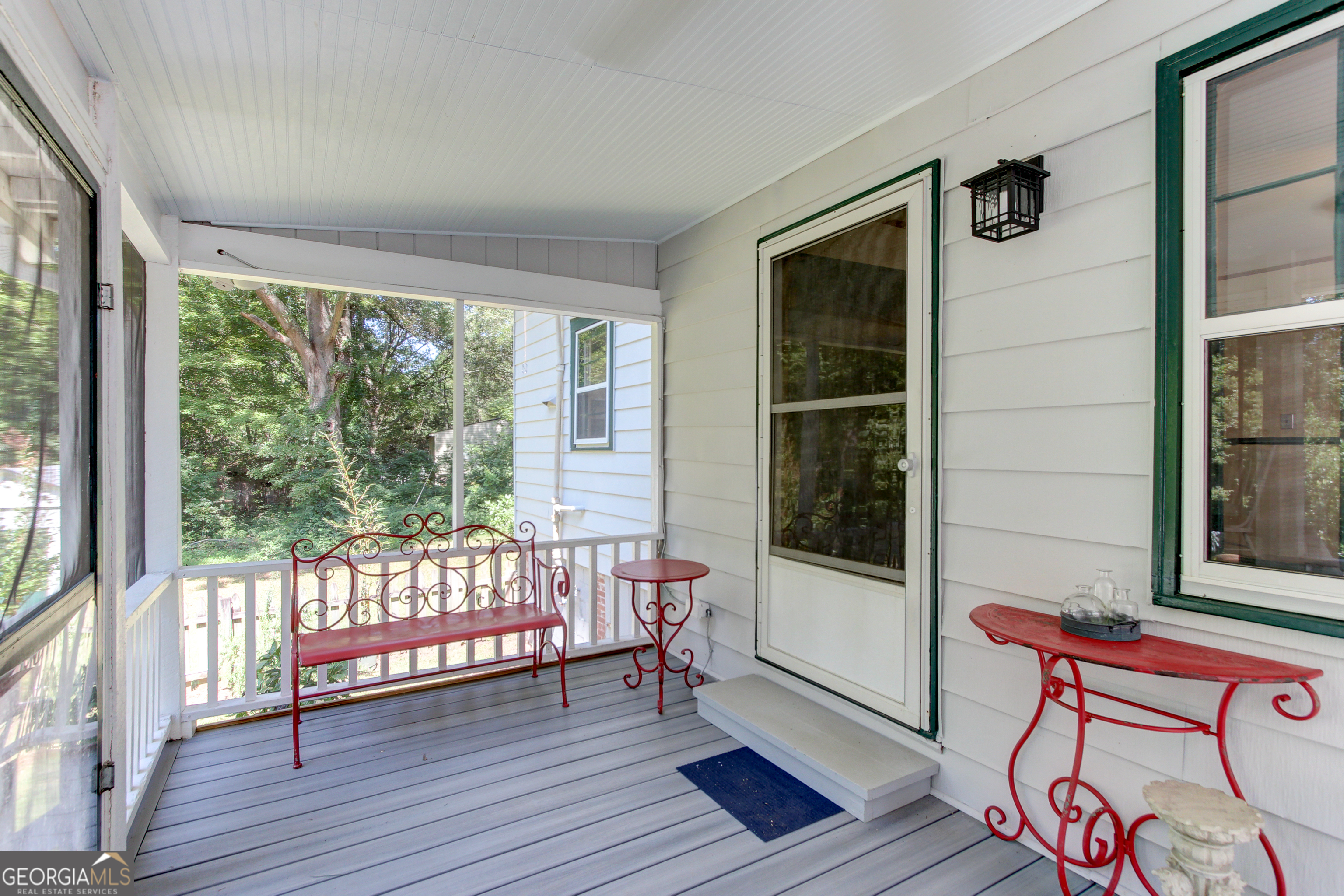 127 Wilkins Road Fayetteville, GA 30214 - Photo 35 of 53 a view of an empty room with wooden floor and a window
