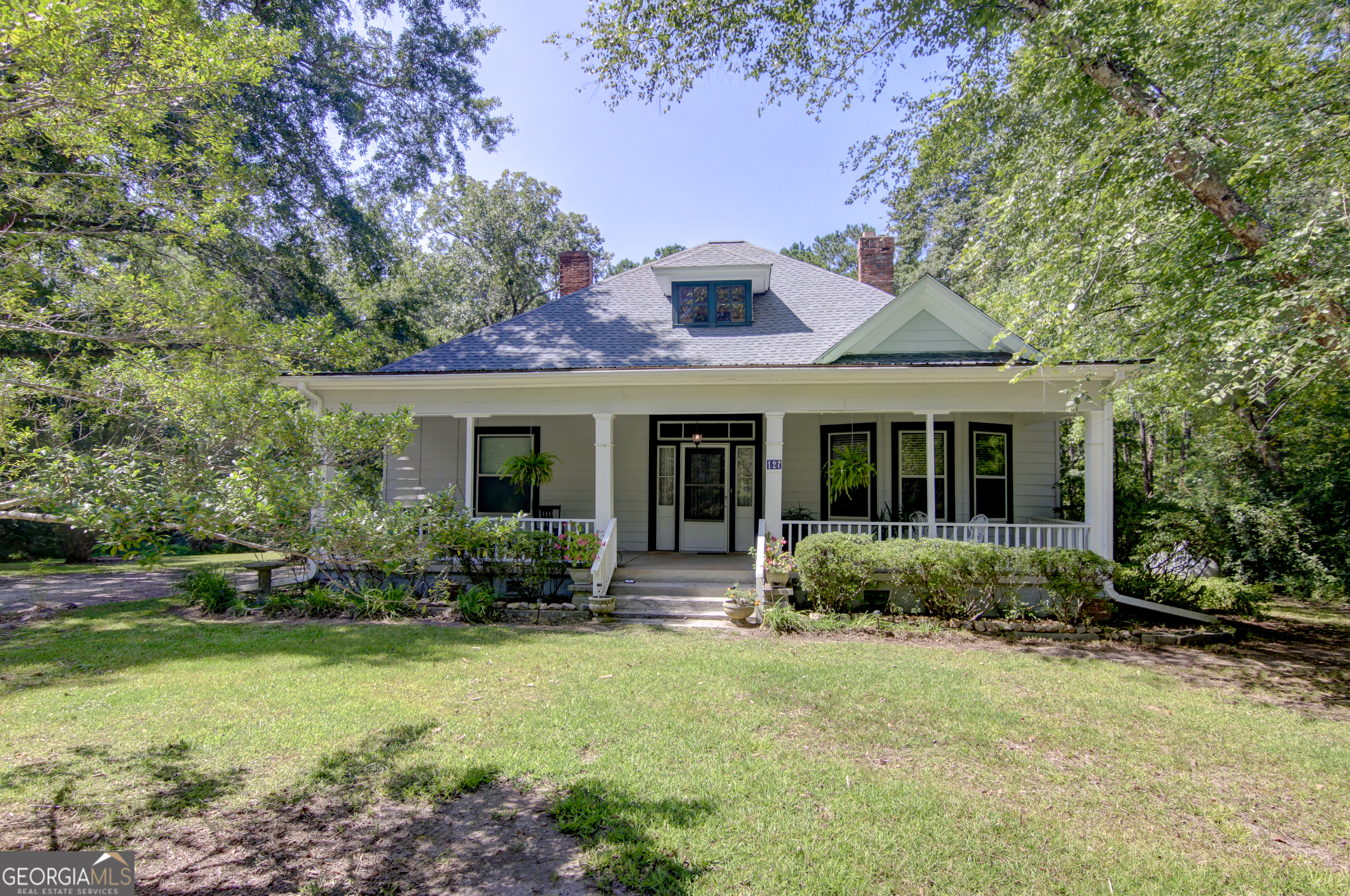 127 Wilkins Road Fayetteville, GA 30214 - Photo 49 of 53 a front view of a house with garden