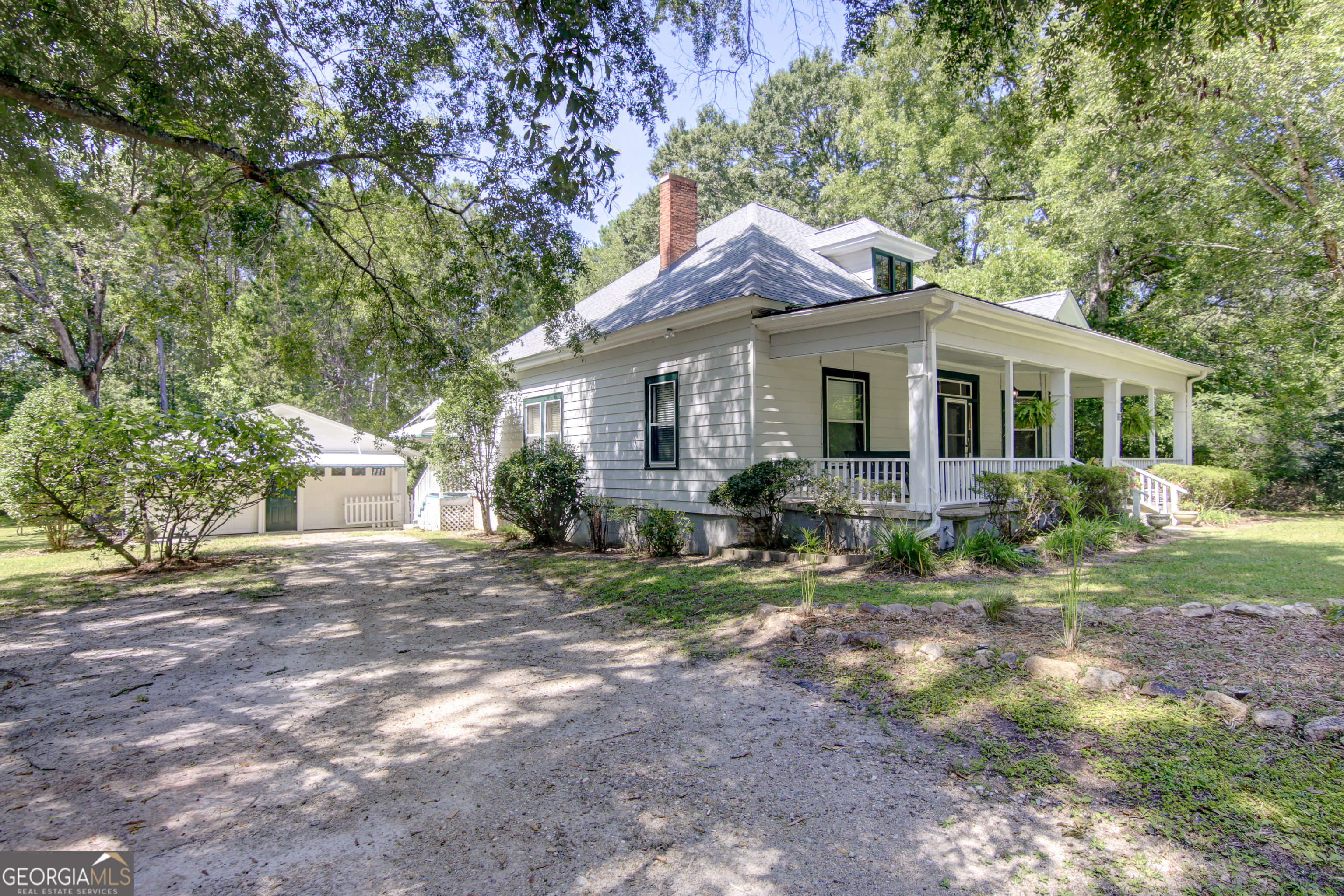 127 Wilkins Road Fayetteville, GA 30214 - Photo 50 of 53 a front view of a house with a yard