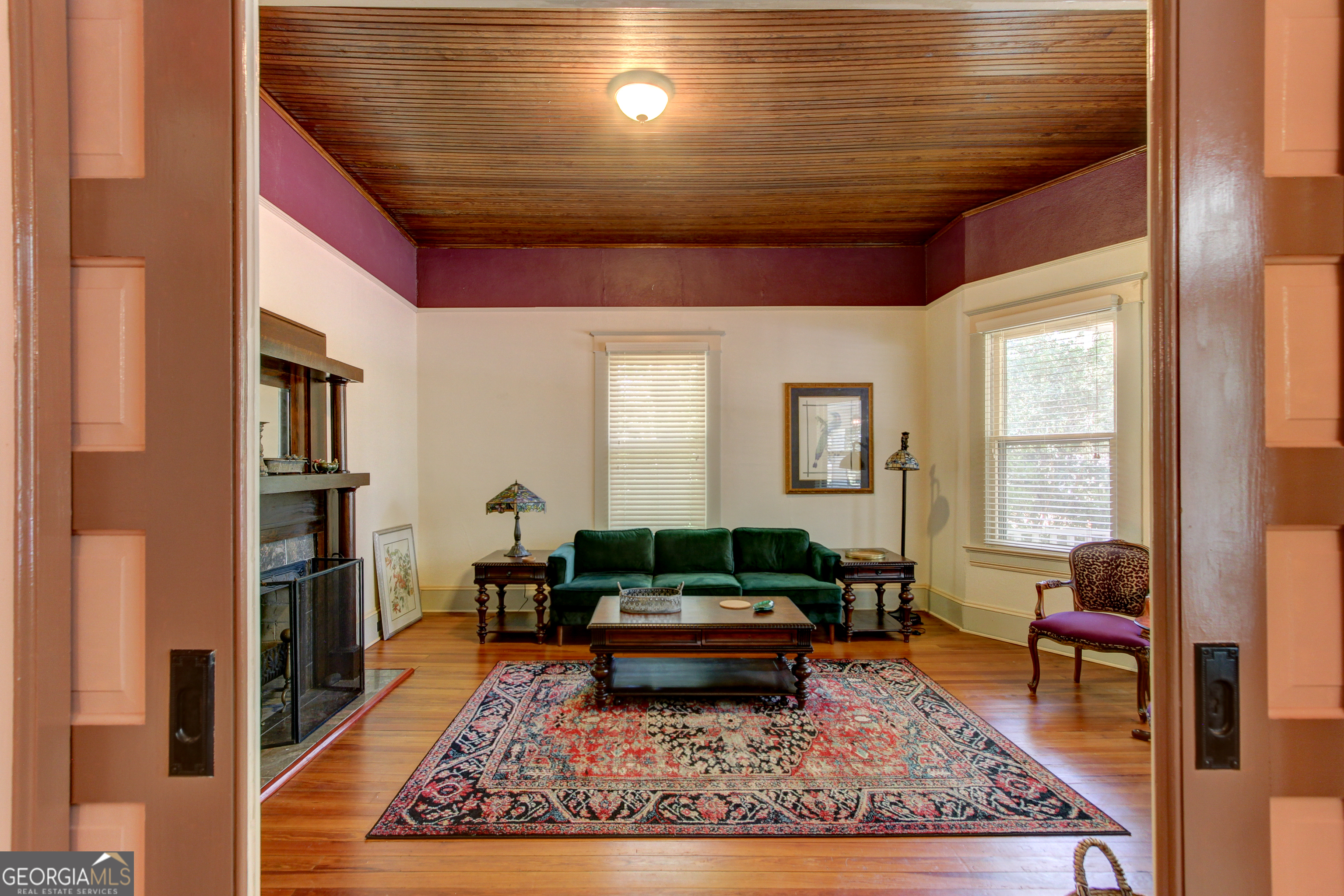 127 Wilkins Road Fayetteville, GA 30214 - Photo 9 of 53 a living room with furniture and a rug