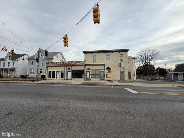 front view of a building with a street