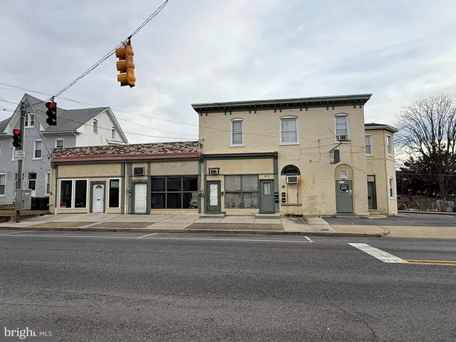 a view of car parked in front of house