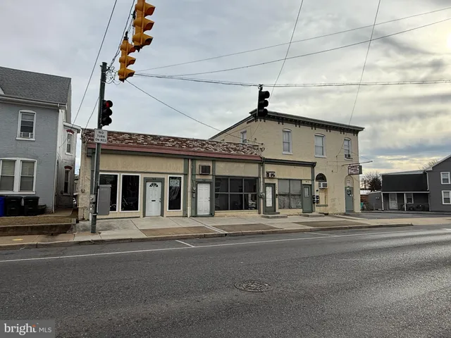 a view of a building with a street