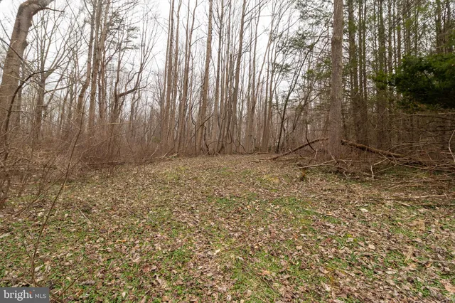 a view of covered with wooden fence