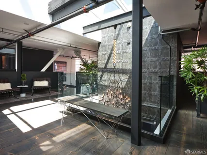 a outdoor space with lots of furniture and shower