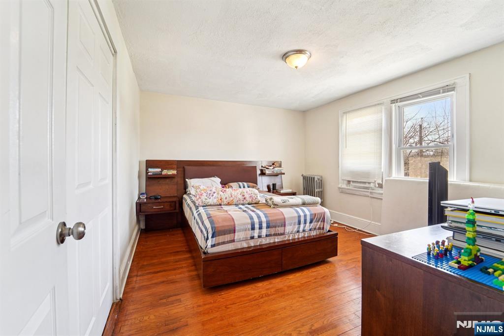 359 Bogert Avenue Ridgewood, NJ 07450 - Photo 11 of 17 a bedroom with bed and a window