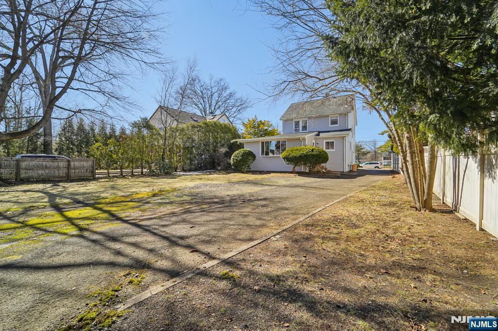 359 Bogert Avenue Ridgewood, NJ 07450 - Photo 13 of 17 a view of a house with a yard