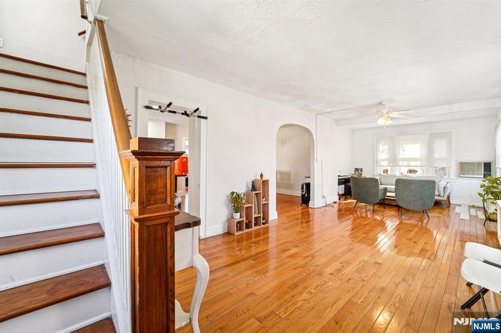 359 Bogert Avenue Ridgewood, NJ 07450 - Photo 2 of 17 a view of a living room with furniture and wooden floor