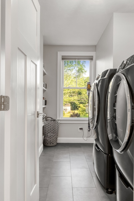 540 Pulaski Boulevard Bellingham, MA 02019 - Photo 33 of 42 a bathroom with a tub sink and mirror