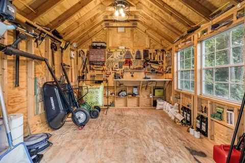 a view of a chairs and bench in the roof