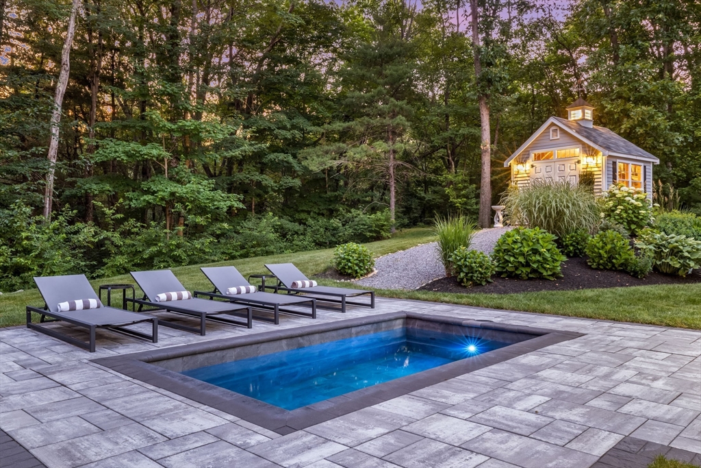 540 Pulaski Boulevard Bellingham, MA 02019 - Photo 40 of 42 a view of swimming pool with lounge chair and garden