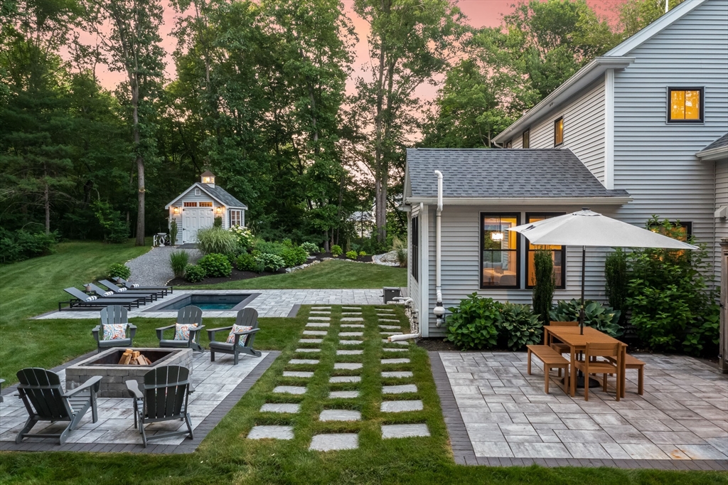 540 Pulaski Boulevard Bellingham, MA 02019 - Photo 4 of 42 a front view of house with yard and outdoor seating