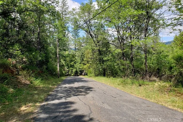 a view of a lake with a building in the background