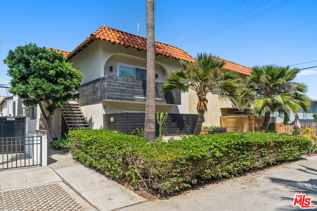35 Catamaran Street, Unit 3 Marina del Rey, CA 90292 - Photo 10 of 11 a front view of a house with a yard