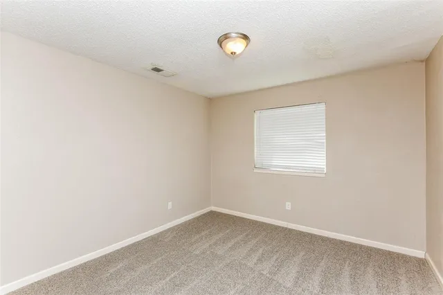 a view of a room with a window