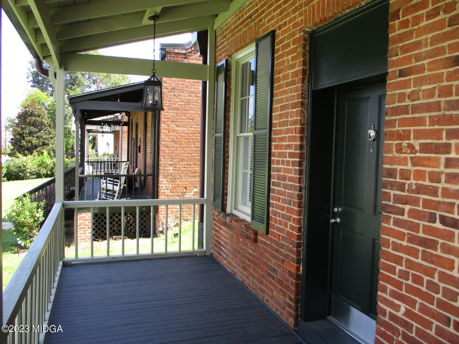 688 Monroe Street Macon, GA 31201 - Photo 26 of 26 a view of a balcony with wooden floor