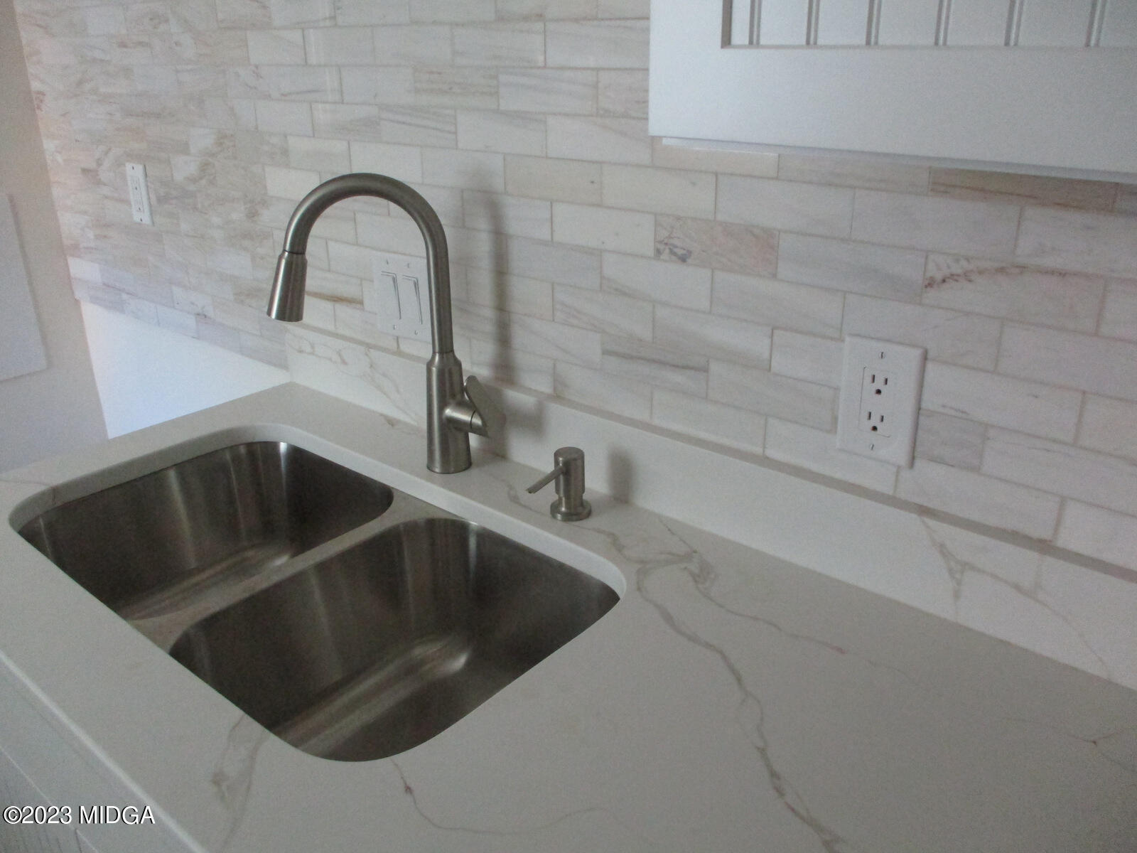688 Monroe Street Macon, GA 31201 - Photo 7 of 26 a close view of sink and tap