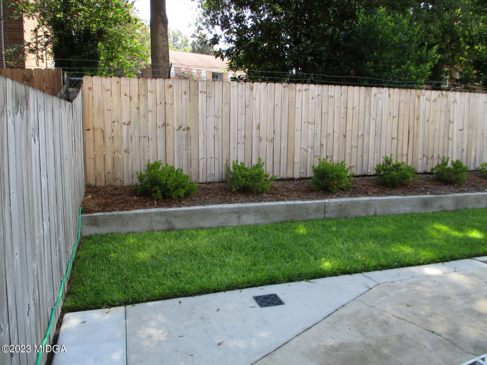 688 Monroe Street Macon, GA 31201 - Photo 10 of 26 a view of a backyard with wooden fence