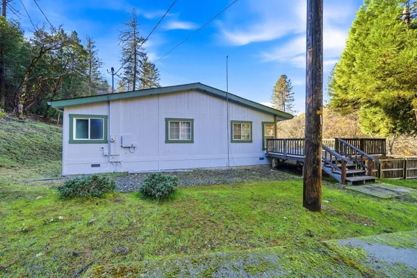 a aerial view of a house with swimming pool