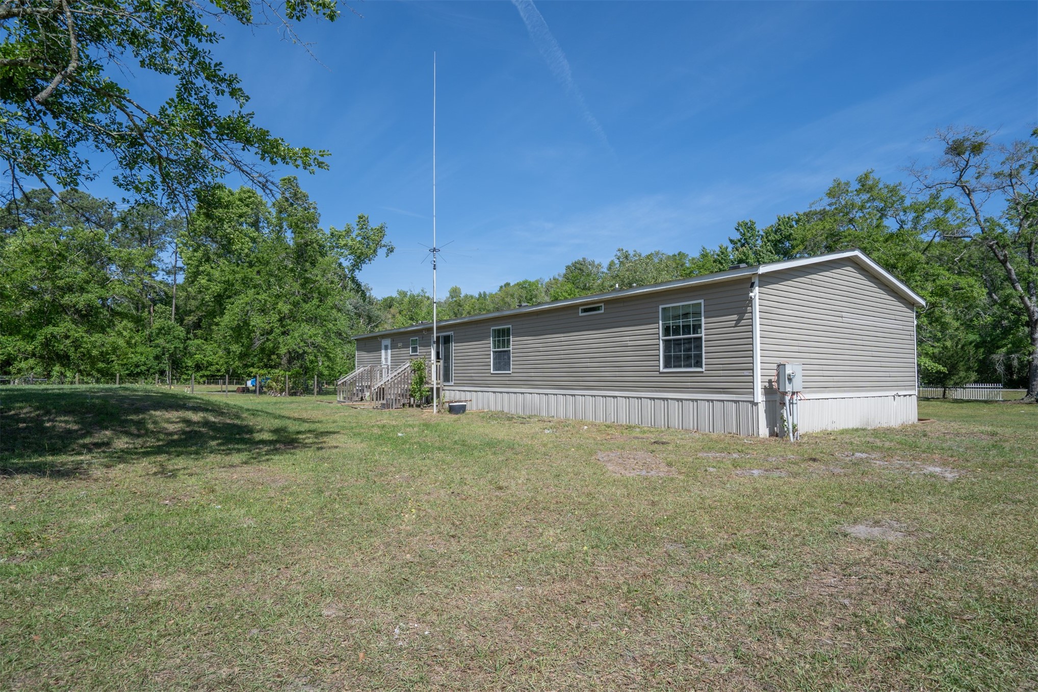 76220 Dove Road Yulee, FL 32097 - Photo 44 of 48 a view of a house with a yard